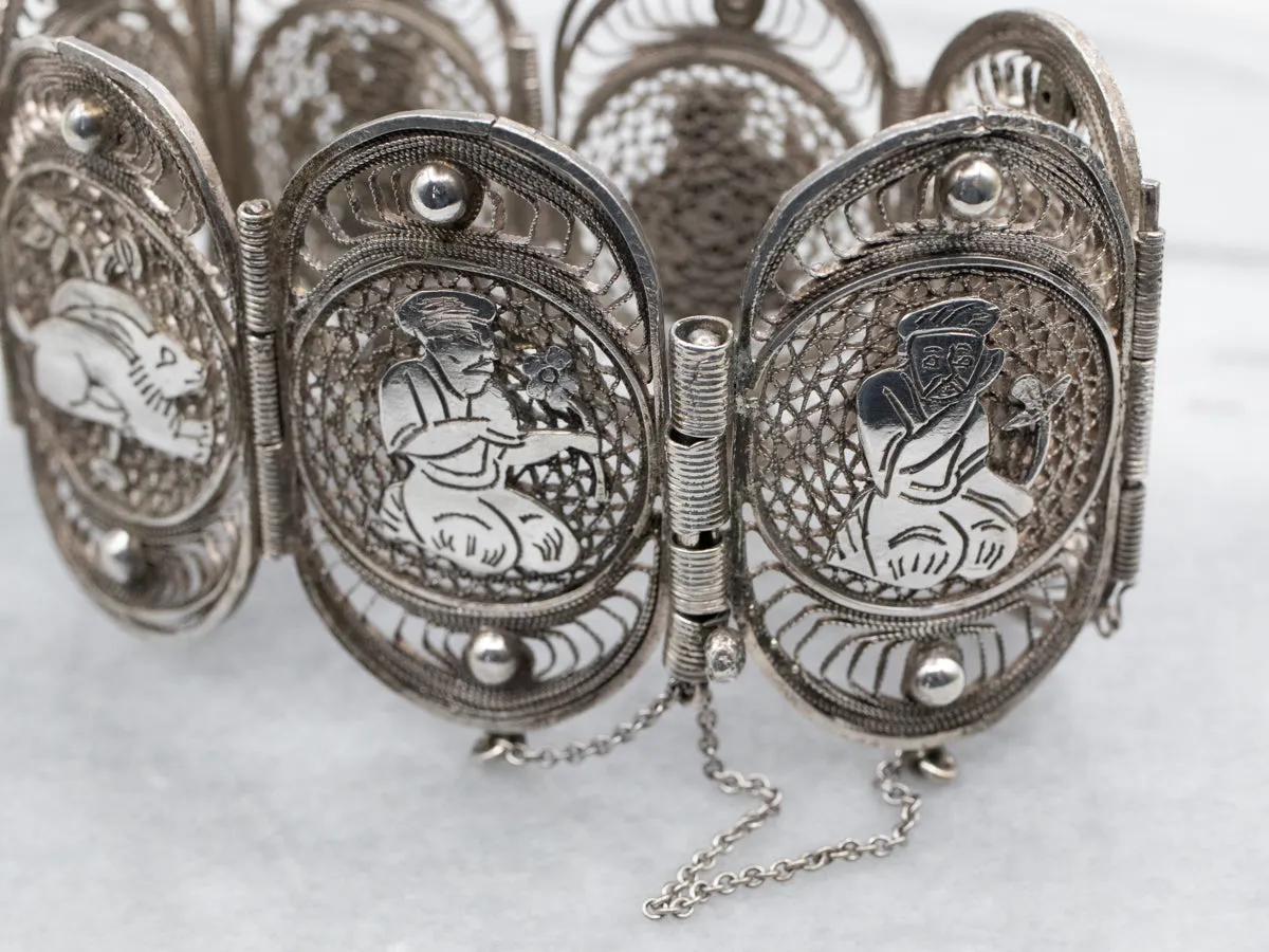 800 Silver Filigree Panel Bracelet Depicting Kneeling Figures