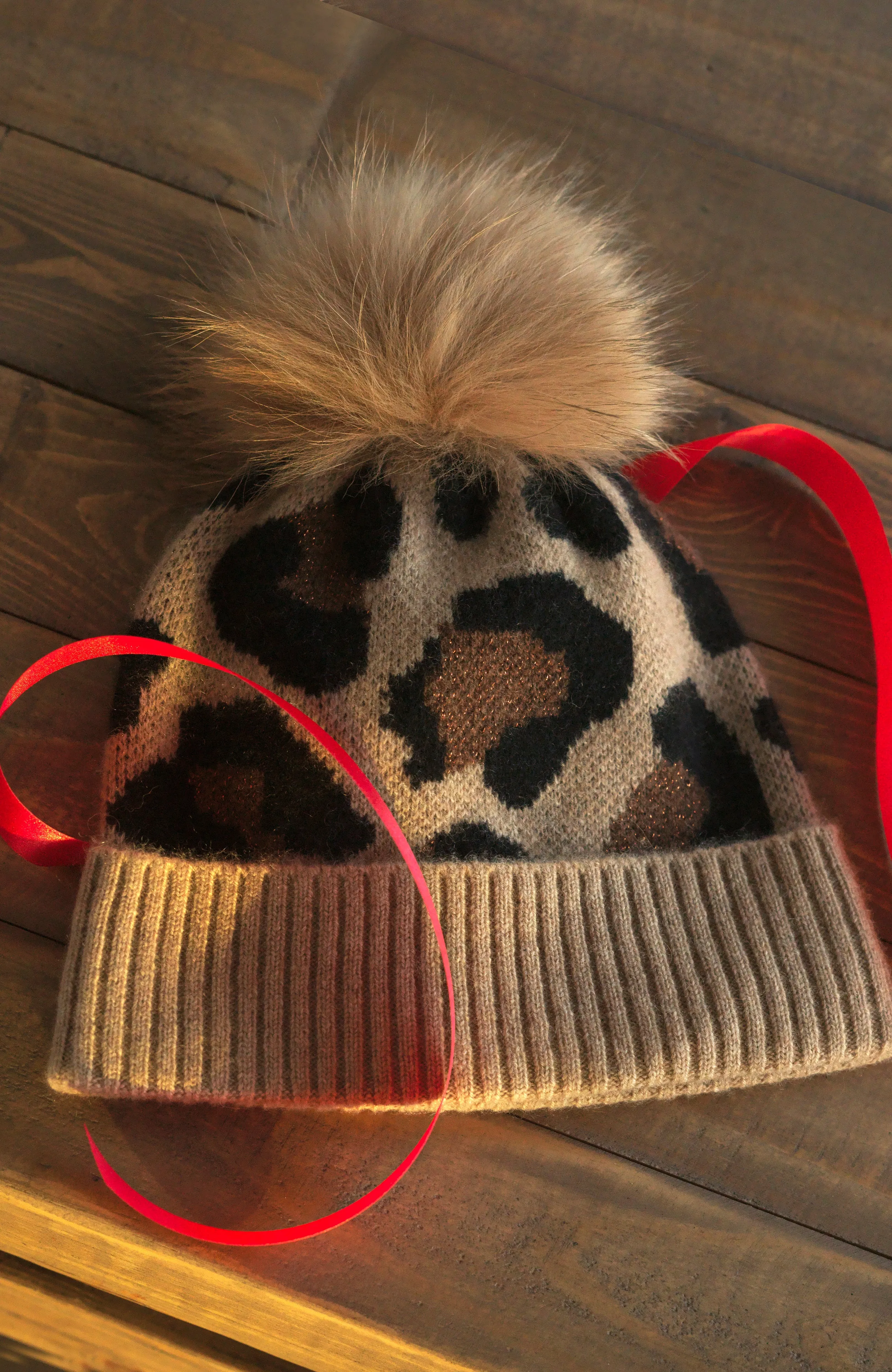 CHEETAH PRINT CASHMERE HAT WITH SHEARLING POM