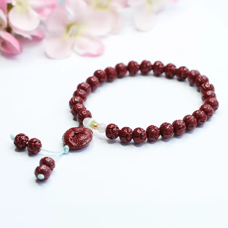 Double Fish Bracelet with Purple Gold Sand, Lotus Beads, and Cinnabar